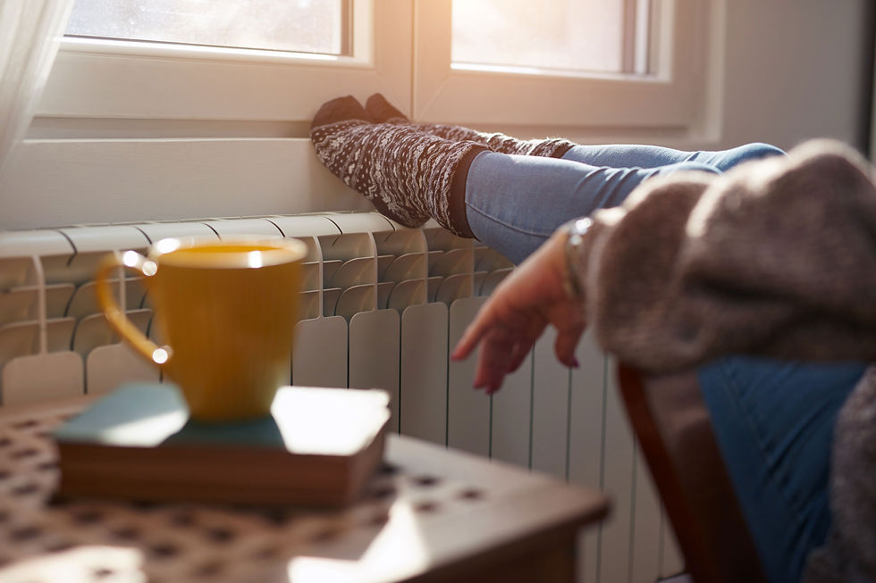 cold-woman-feet-on-radiator.jpg