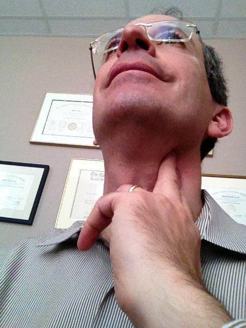 Checking Pulse via Carotid Artery in Neck