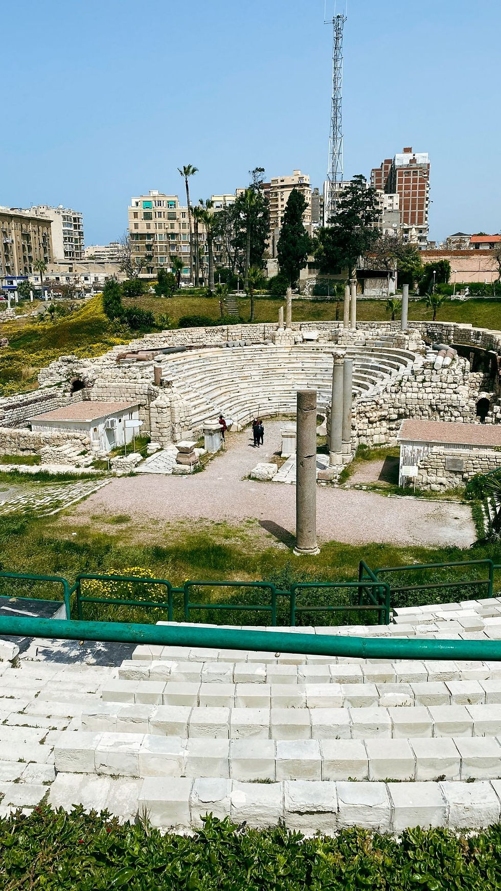 Roman Amphitheatre in Alexandria, showcasing ancient architecture with stone seating and archaeological remains, highlighting the Greco-Roman period.