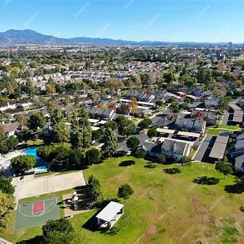 https://img.freepik.com/premium-photo/aerial-view-of-little-park-in-residential-suburban-neighborhood-in-irvine-orange-county-california_571748-3039.jpg?w=2000