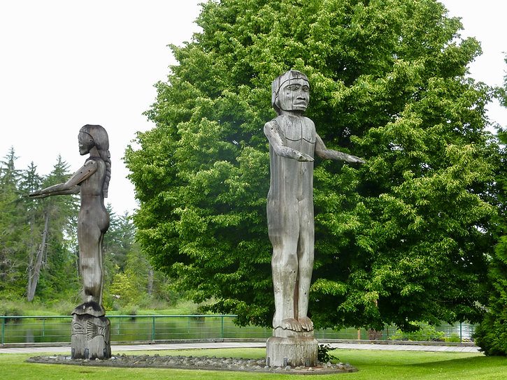 Tseshaht First Nation carved poles | Victoria Quay Park in Port Alberni | cycle touring Vancouver Island