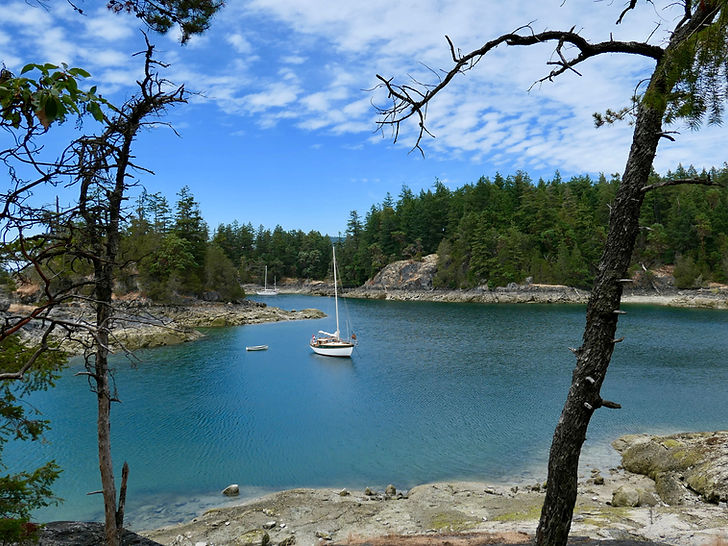 Sailboats moored in Smuggler Cove | fav campground | cycle touring Sunshine Coast