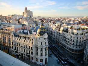Gran Vía lit up at night, Madrid's most filmed street