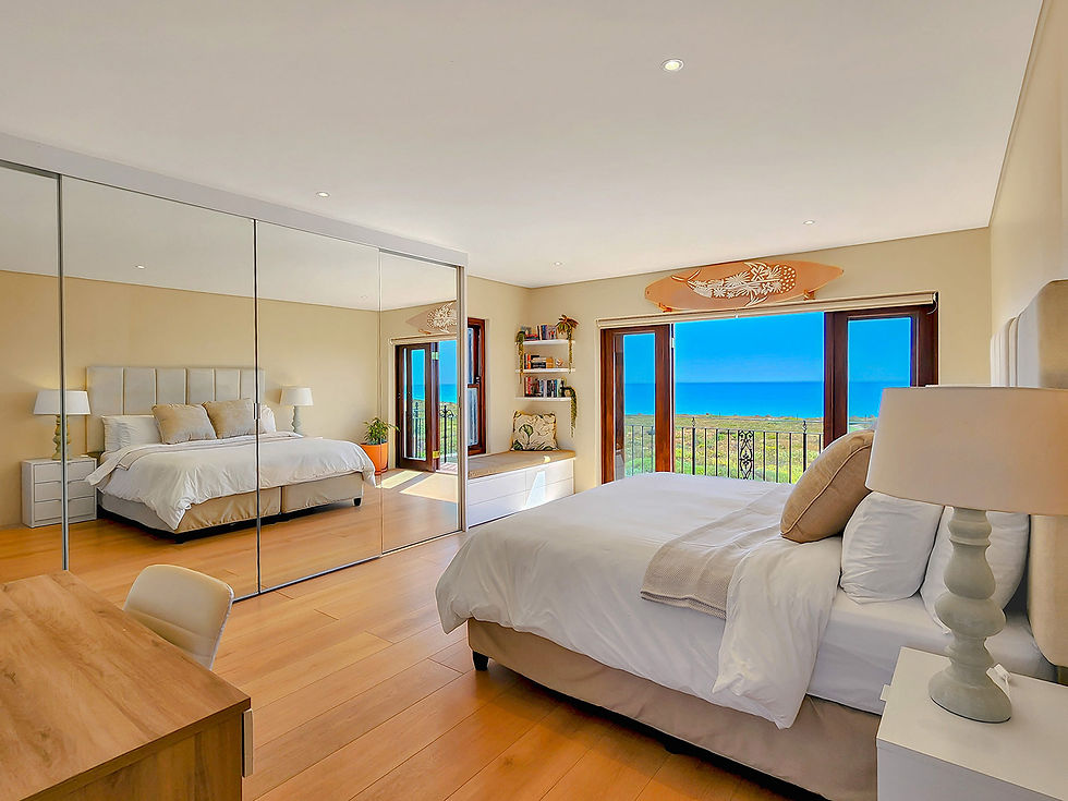 Spacious Ocean-Facing Bedroom – Sunset Beach Villa Cape Town