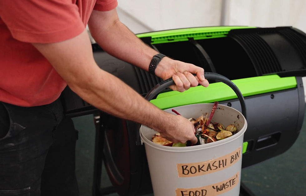 person composting food waste