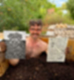 Alex Montgomery, founder of Generation Soil holding soil art by Bristol Artist Theo Adams