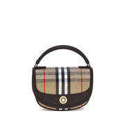For petite women, selecting the right bag is key to enhancing style and appearing taller. Focus on medium or small bags to maintain proportion. The bag's resting point, ideally around hip level, can elongate legs. Opt for lighter, neutral colors and proportionate patterns. Recommended styles include crossbody bags, baguette bags, and small shoulder bags for their balancing effects. When choosing top-handle bags, avoid bulky styles. Experimentation with size, strap length, and color is essential for achieving an elegant, height-enhancing look.