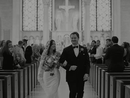Wedding Couple walking down the church aisle 