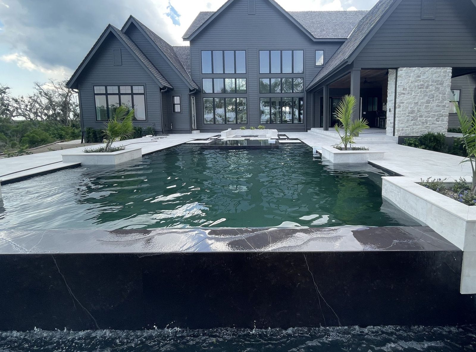 Infinity-edge pool and spa at a custom Northeast Florida home