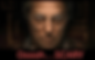 Close-up of Hugh Grant in Heretic with the words "Oooooh... Scary" beneaht