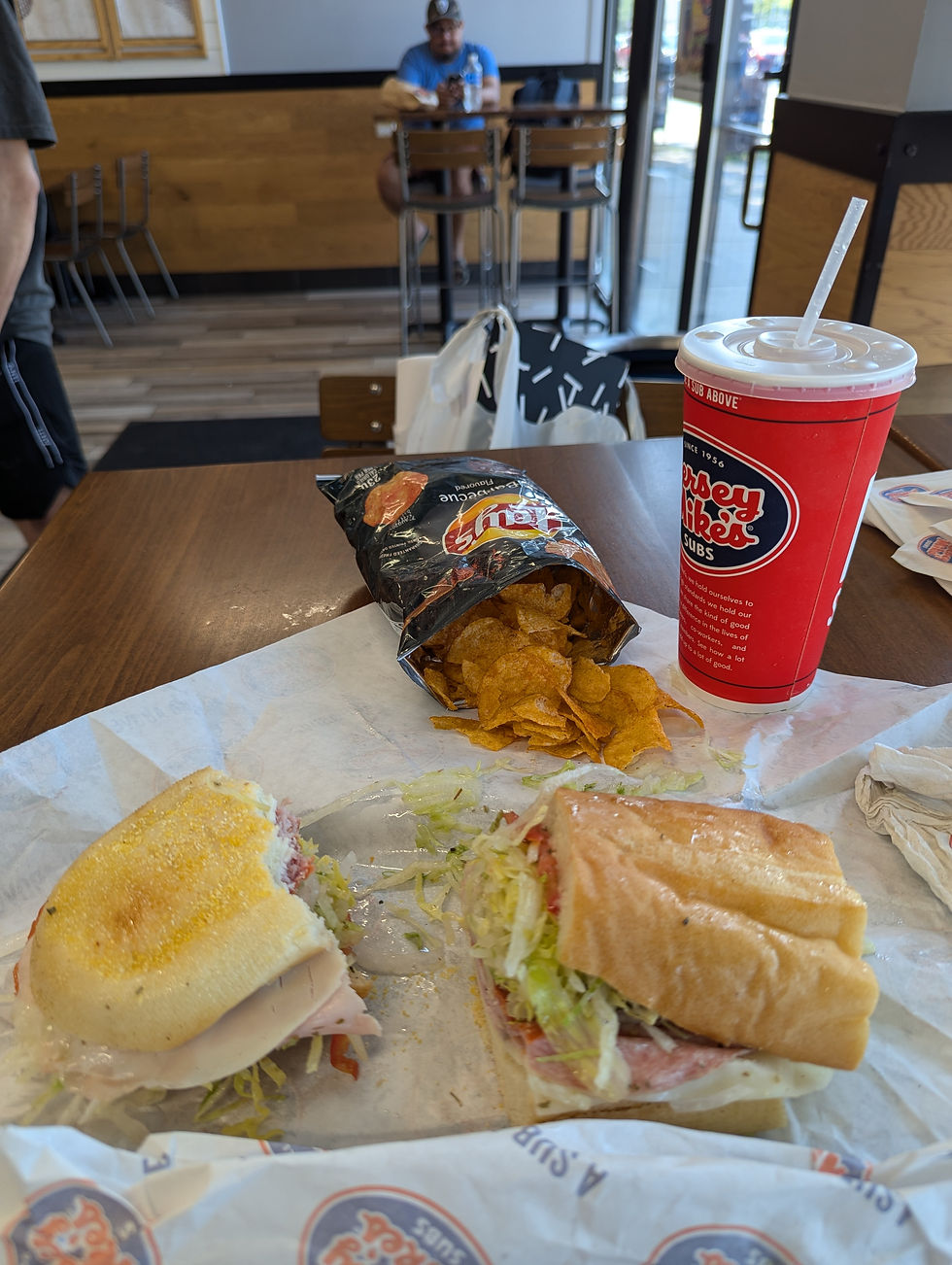 Jersey Mike's sub, chips, and drink