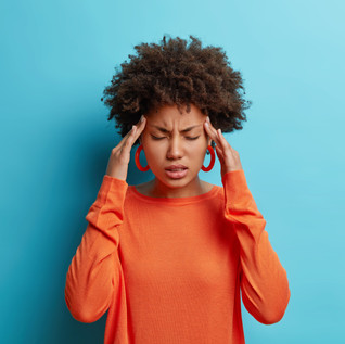 AdobeStock_Af-AmWomanHeadache.May#1.jpeg