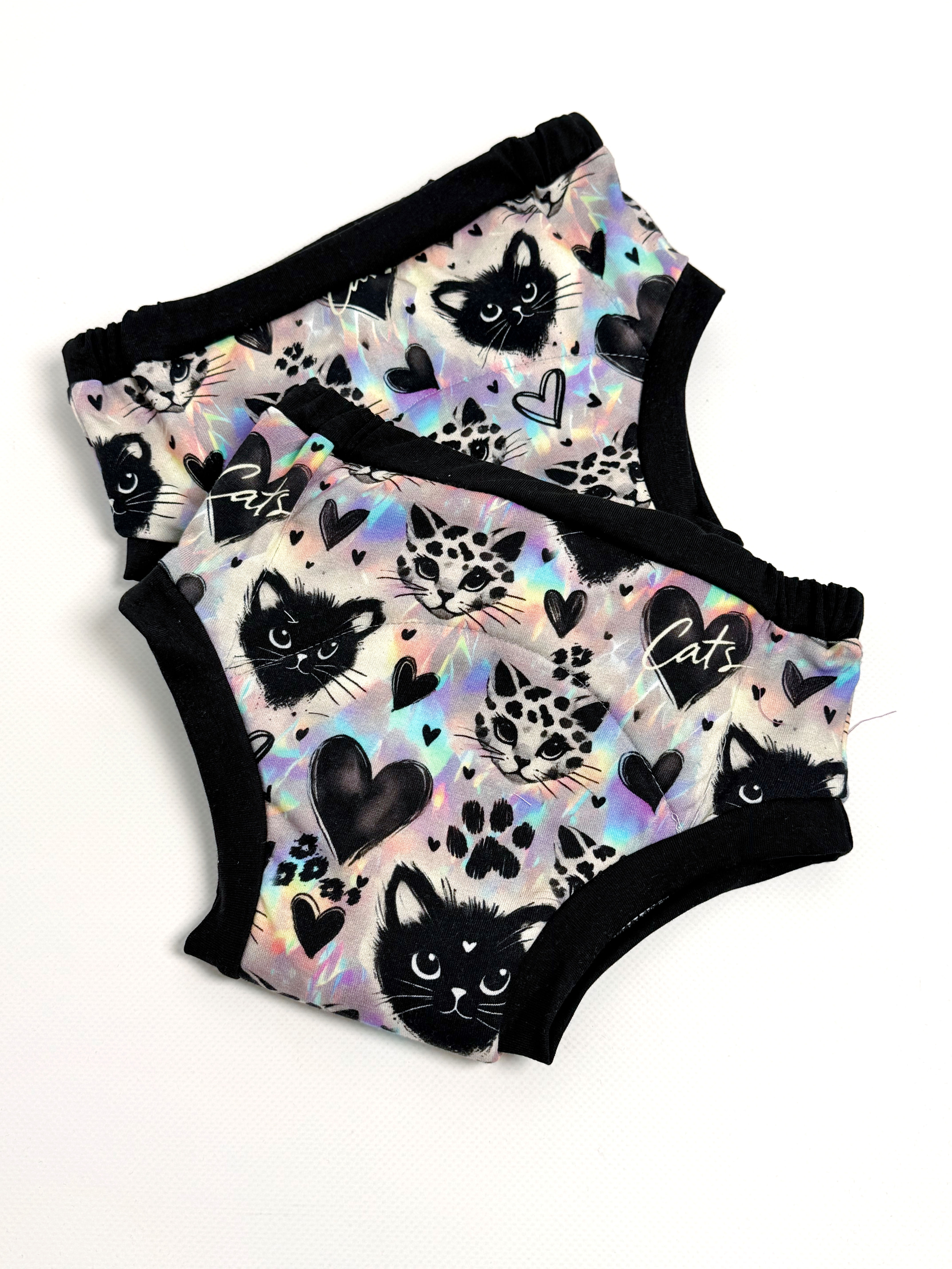 Блискучі котики (збільшена вкладка)