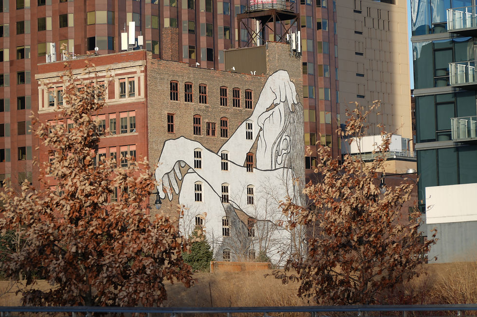 Brick building with art painting on the back of the building in Chicago, Illinois