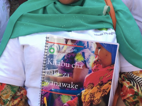 Husna finds out that she is on the cover of our Training Manual