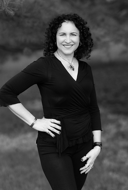 Headshot B&W standing.jpg