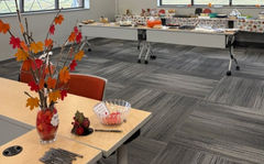 Tables with autumn leaf decorations for an event