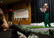 Speaker on stage at Recycled Runway event