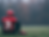 u1916111652_realistic_photo_of_a_football_player_sitting_down_a71e39d5-4f38-4aa4-960b-b2e1