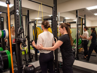 Physical therapist working with a patient with TMD teeth pain to improve strength to decrease jaw pain opening mouth in Burlington, MA 