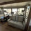 Thumbnail: Interior view of a living area with sofa and large windows. LOCAL RV DEALERSHIP