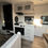 Thumbnail: RV interior kitchen with cabinets, microwave, and stovetop detailing. LOCAL RV DEALERSHIP