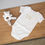Thumbnail: Bambino Baby Suit & Rattle Set