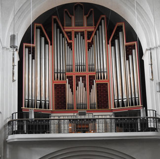 Organ pipes encased, loft over entry