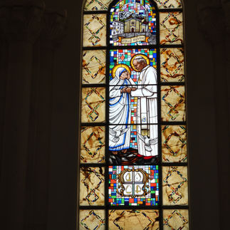 Stained-glass window of Pope and Mother Theresa
