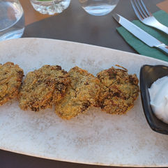 Zucchini fritters at Rastoni Concept, Fira