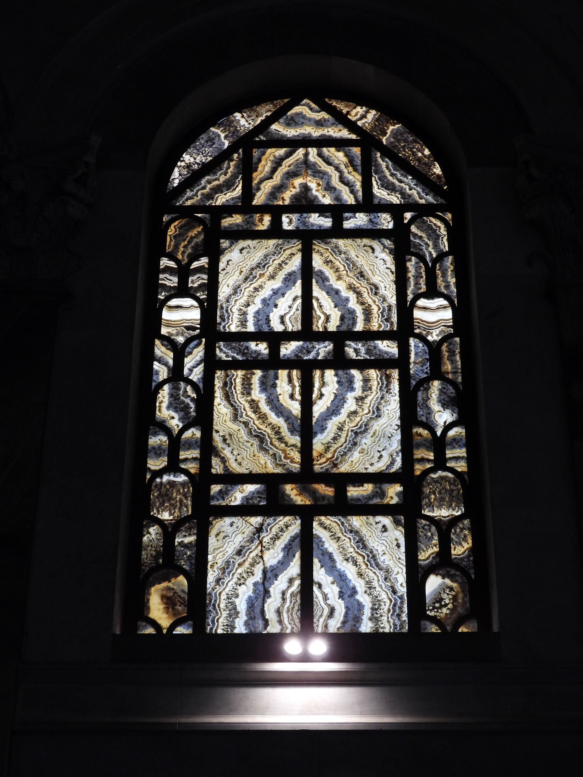 Window of travertine stone