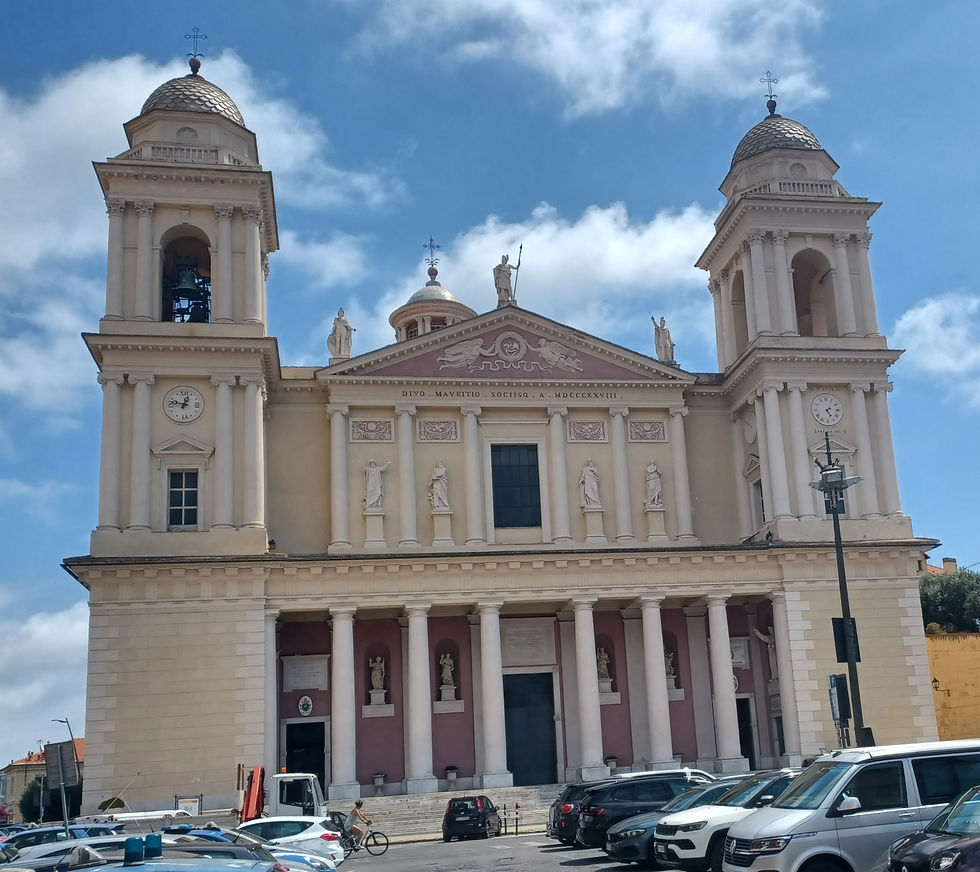 Front facade of the Basilica Concattedrale di San Maurizio e Compagni Martiri / Co-Cathedral Basilica of St. Mauritius and Companions in Imperia, Italy