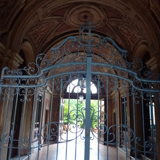 Closed gate into building's courtyard, Modena
