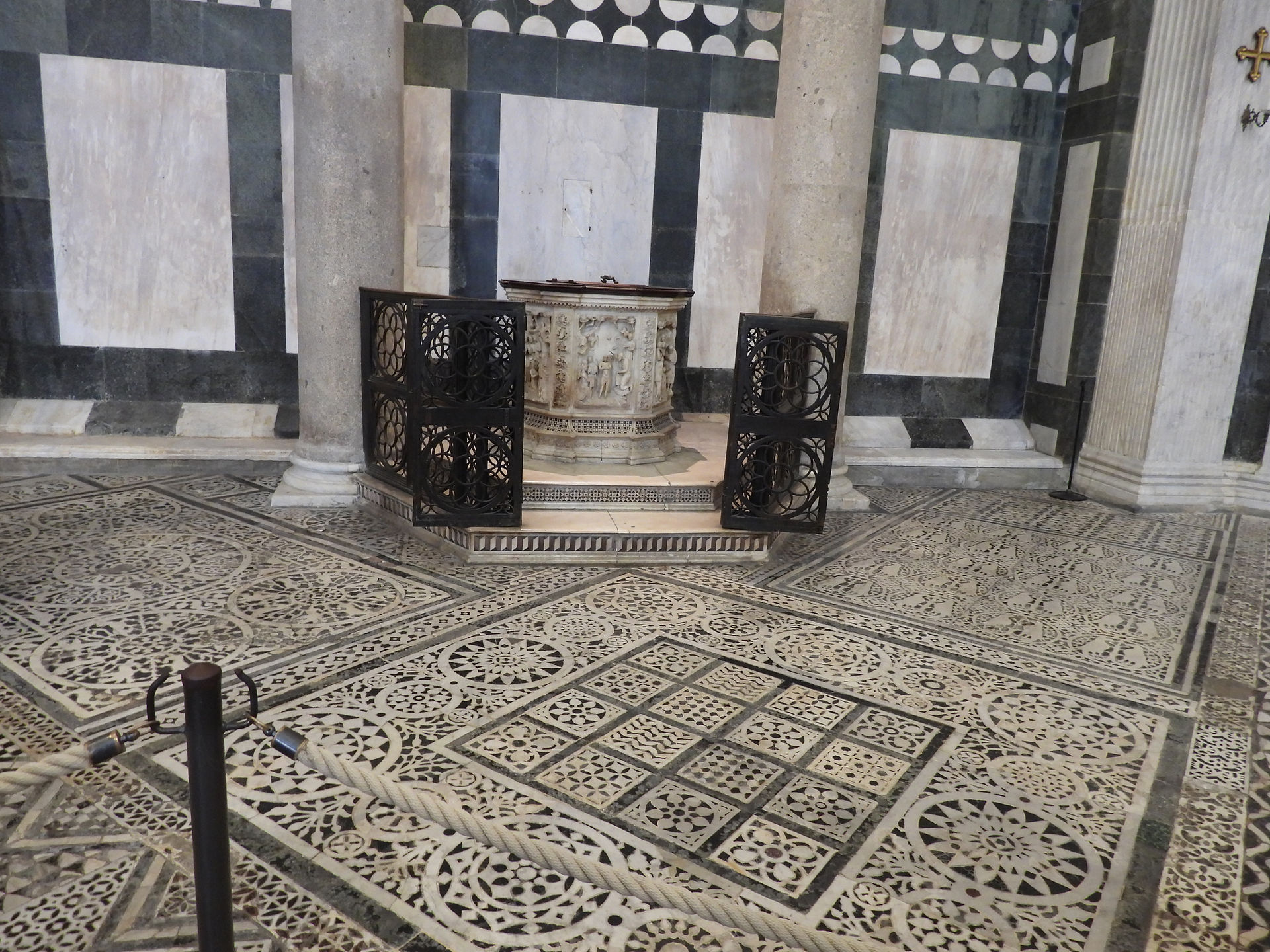 Baptismal font and tile floor in Florence Baptistry
