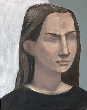 A portrait of a woman whose eyes are slightly obscured