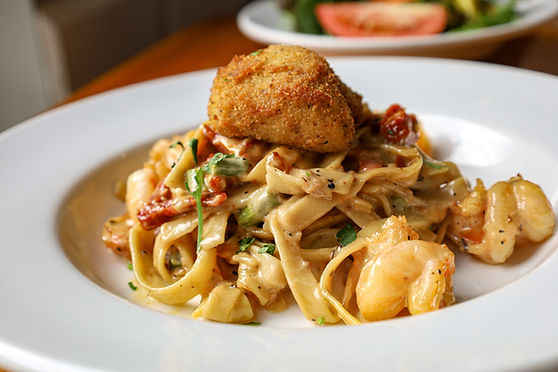 Naples Italian Neto's Special shrimp pasta with fried topping