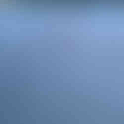 Kids standing near hearts drawn in the sand on the beach in Atlantic Beach, Florida.