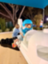 Kids exploring the LEGO rocket play structure in the LEGO Galaxy play area at LEGOLAND Florida