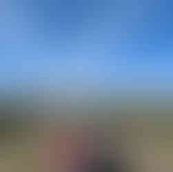 Teton Point Turnout view of snowy Teton Mountain Range .