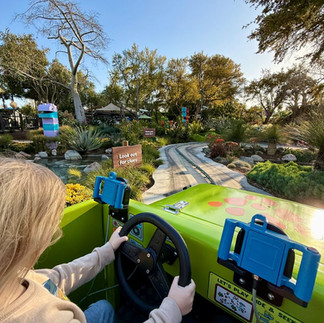 Child enjoying a family-friendly ride at LEGOLAND California Resort in California.