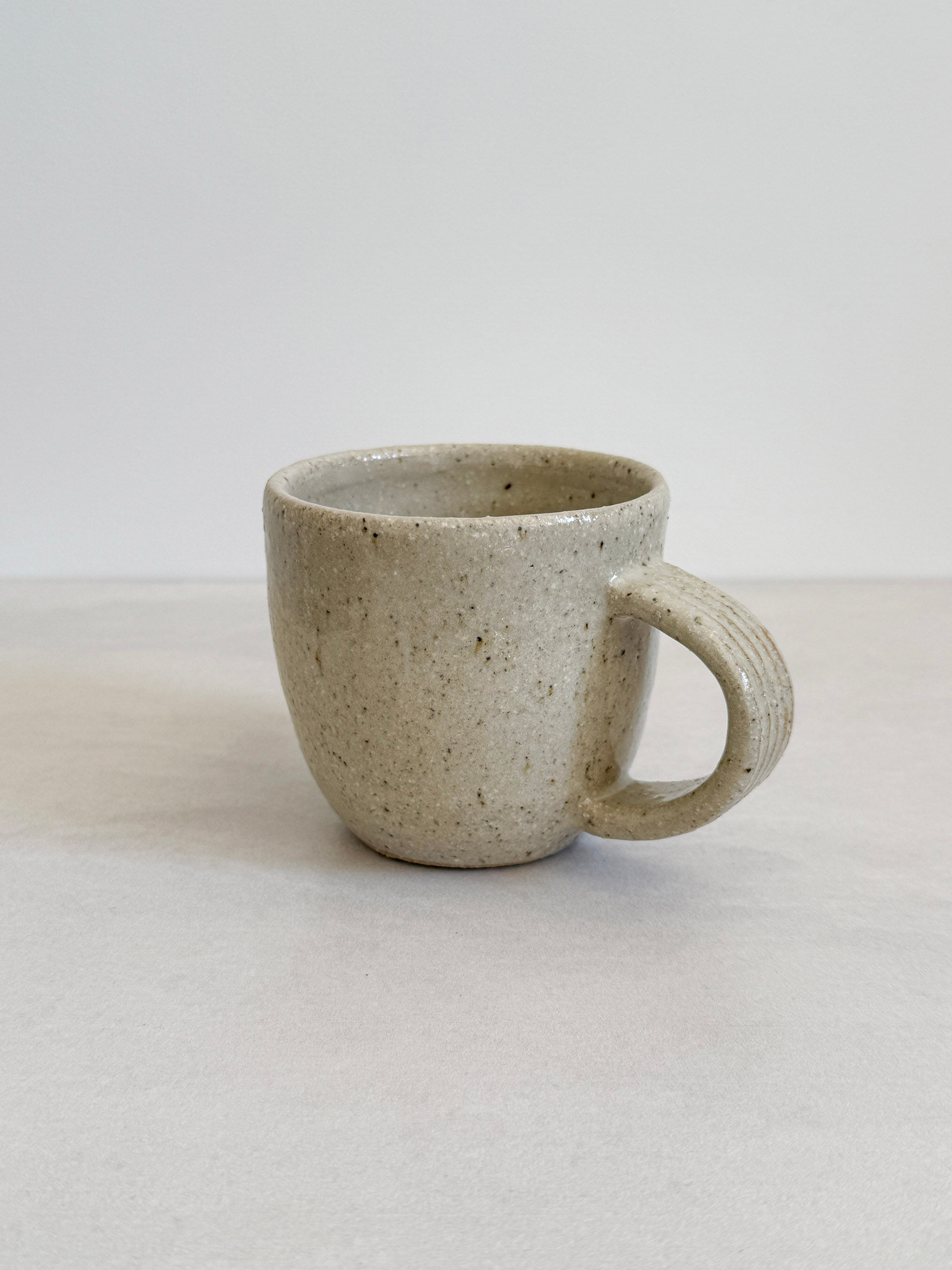 Cream Fluted Handle Mug