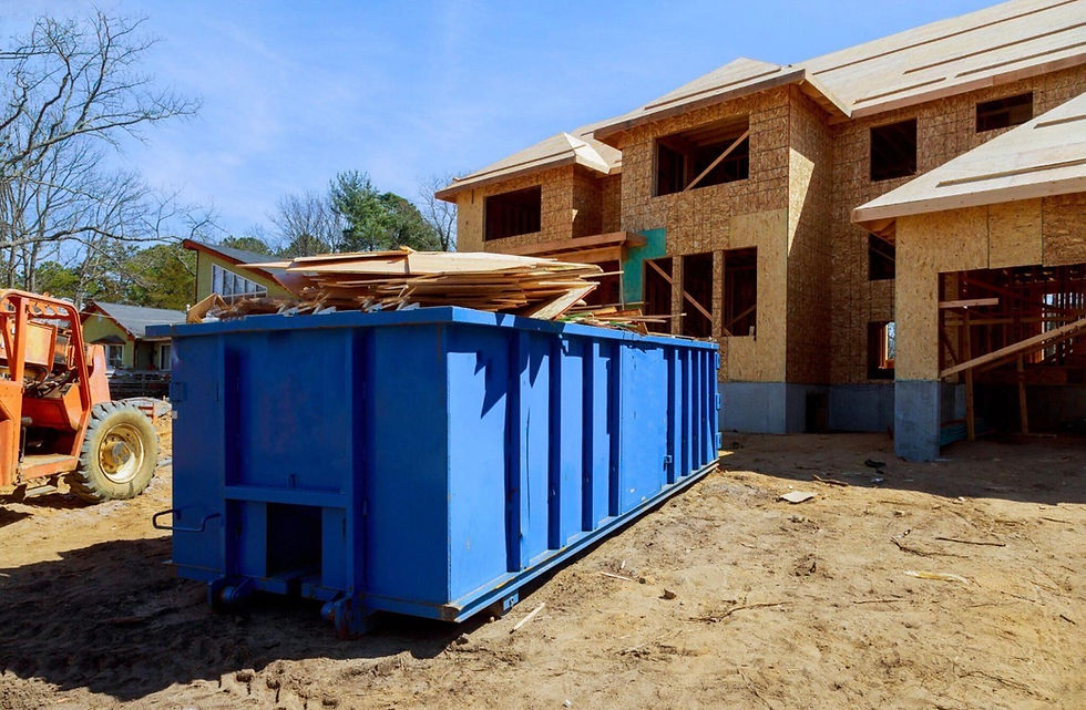Open-top rolloff dumpster at a construction site in Austin, TX