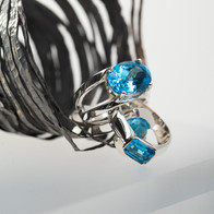 Unravel sculpture and rings