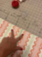 Striped fabric with 4" markings and straight pins at those marks