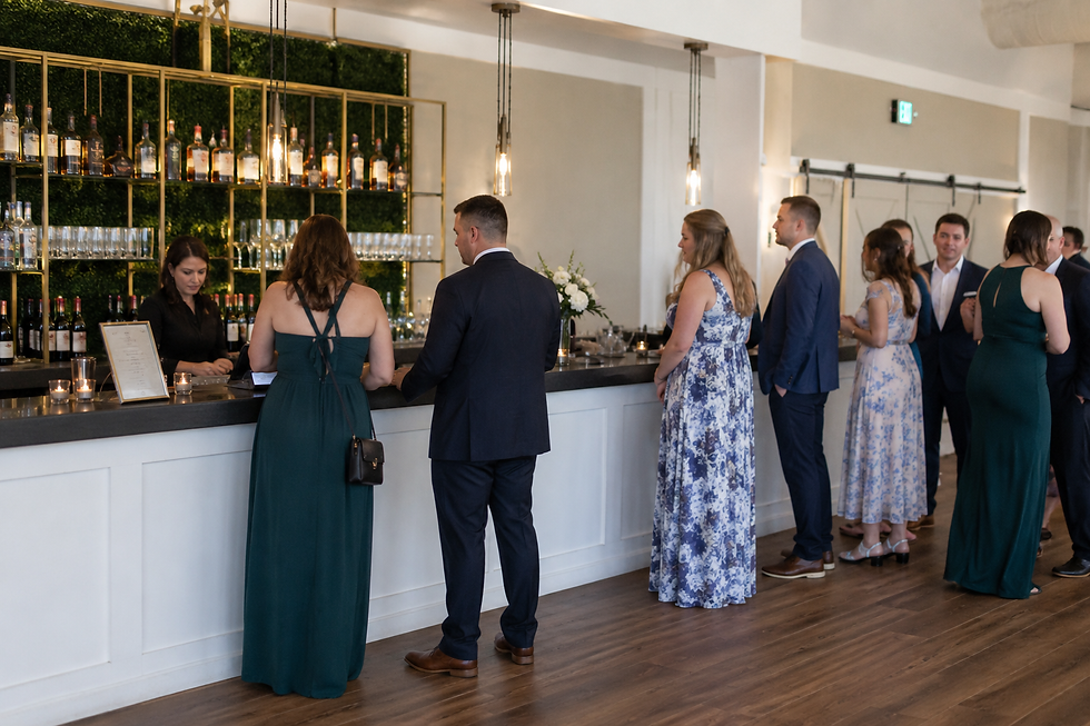 Eye-level view of an elegantly arranged cocktail bar with colorful drinks and garnishes