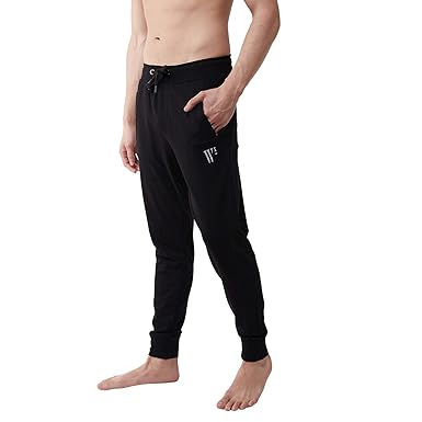 Man modeling black joggers