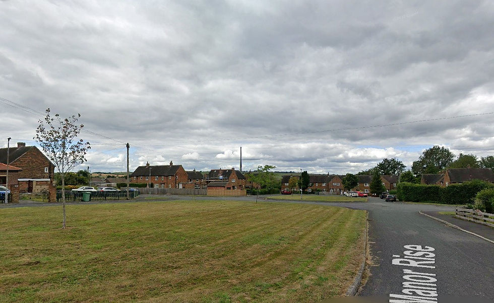 Photograph of Manor Rise with the communication mast visible in the distance