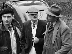 1930s British Civilians Wearing Overalls at a Motor Racing Event