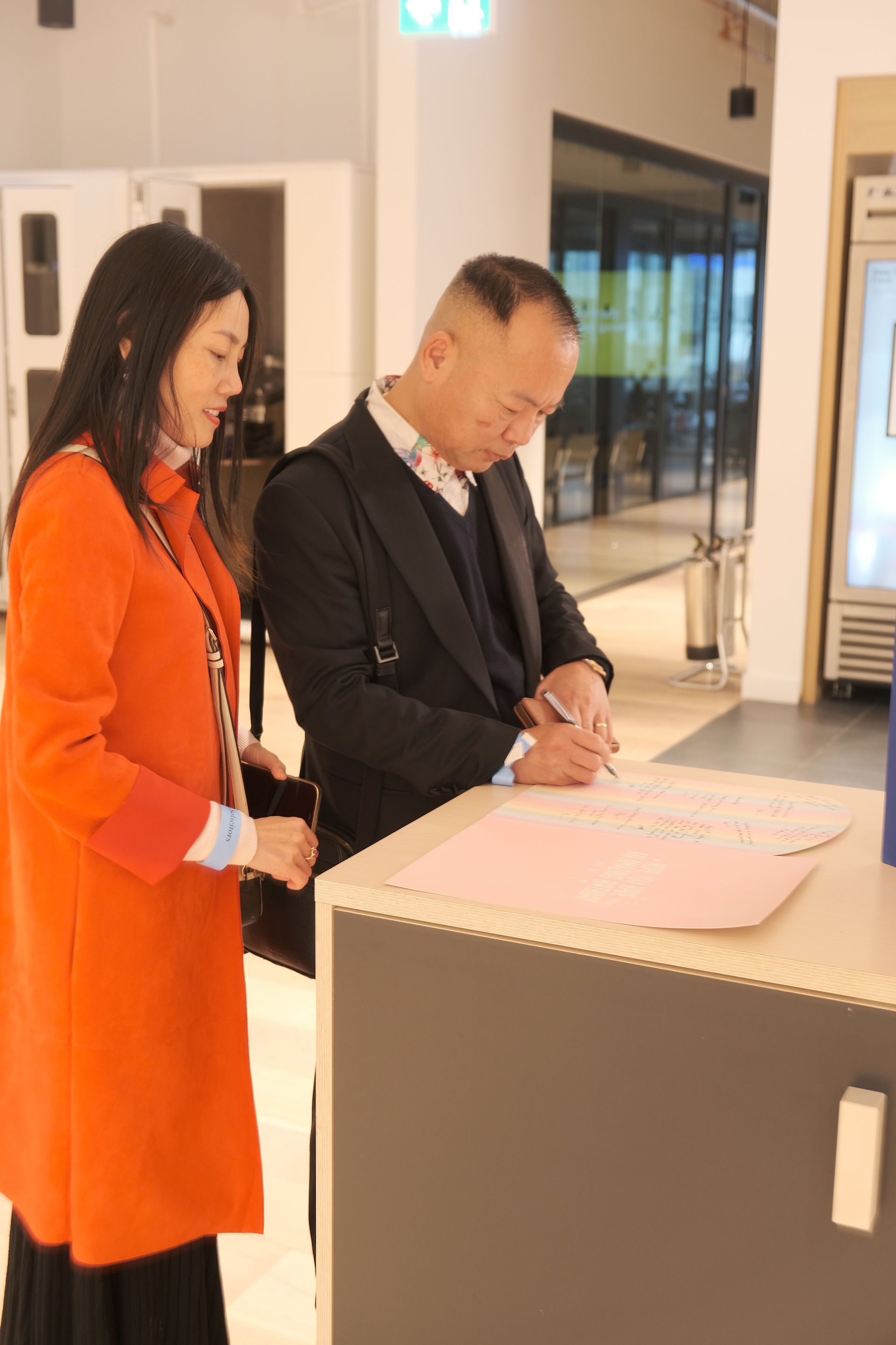 Guest signing the wish book