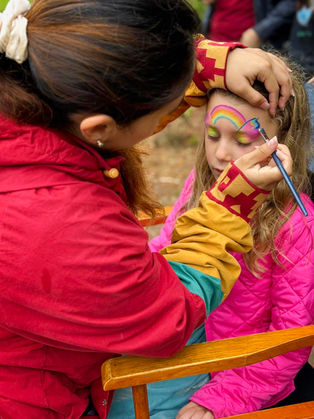 Face painting rainbow and flowers